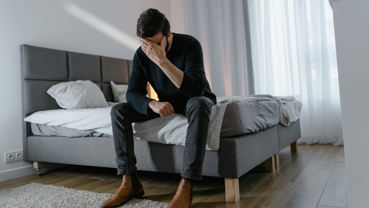 man struggling with delayed ejaculation
